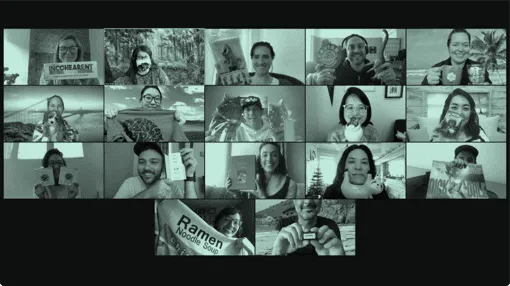 A group of NerdWallet employees on a Zoom call, smiling and waving at the camera