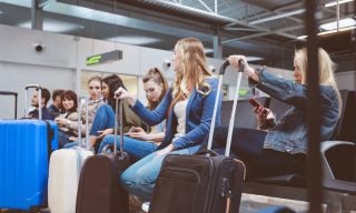 As Midtier Airline Cards Move to 3-Digit Fees, Are The Perks Worth It?