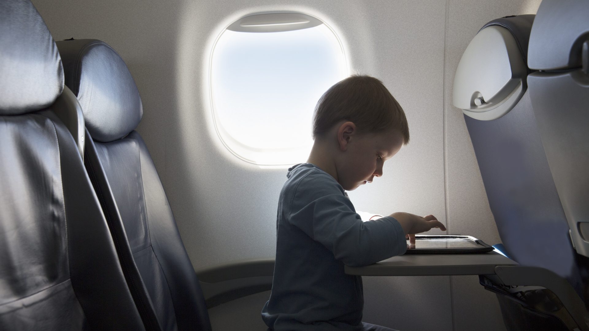 Flight Attendant Sitting In A Jump Seat With A Telephone High-Res Stock  Photo - Getty Images