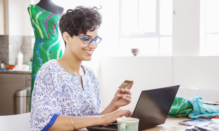 woman wondering if airline credit cards are worth it