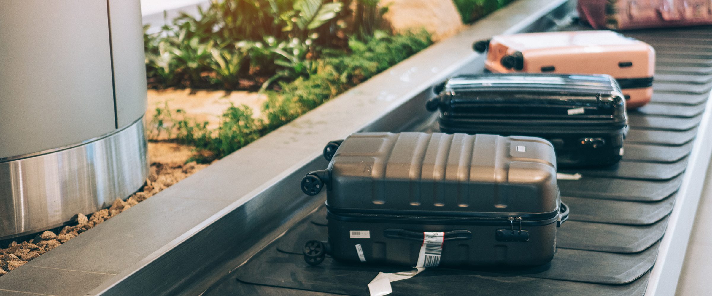 Carry-On vs. Checked Bag: What to Know - NerdWallet