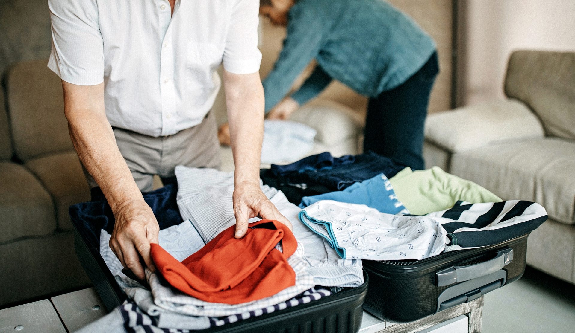 Carry-On vs. Checked Bag: What to Know - NerdWallet