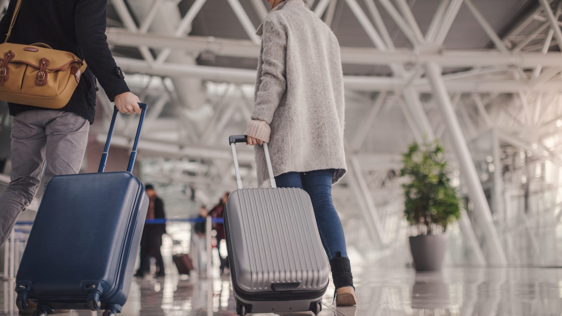 Carry-On vs. Checked Bag: What to Know - NerdWallet