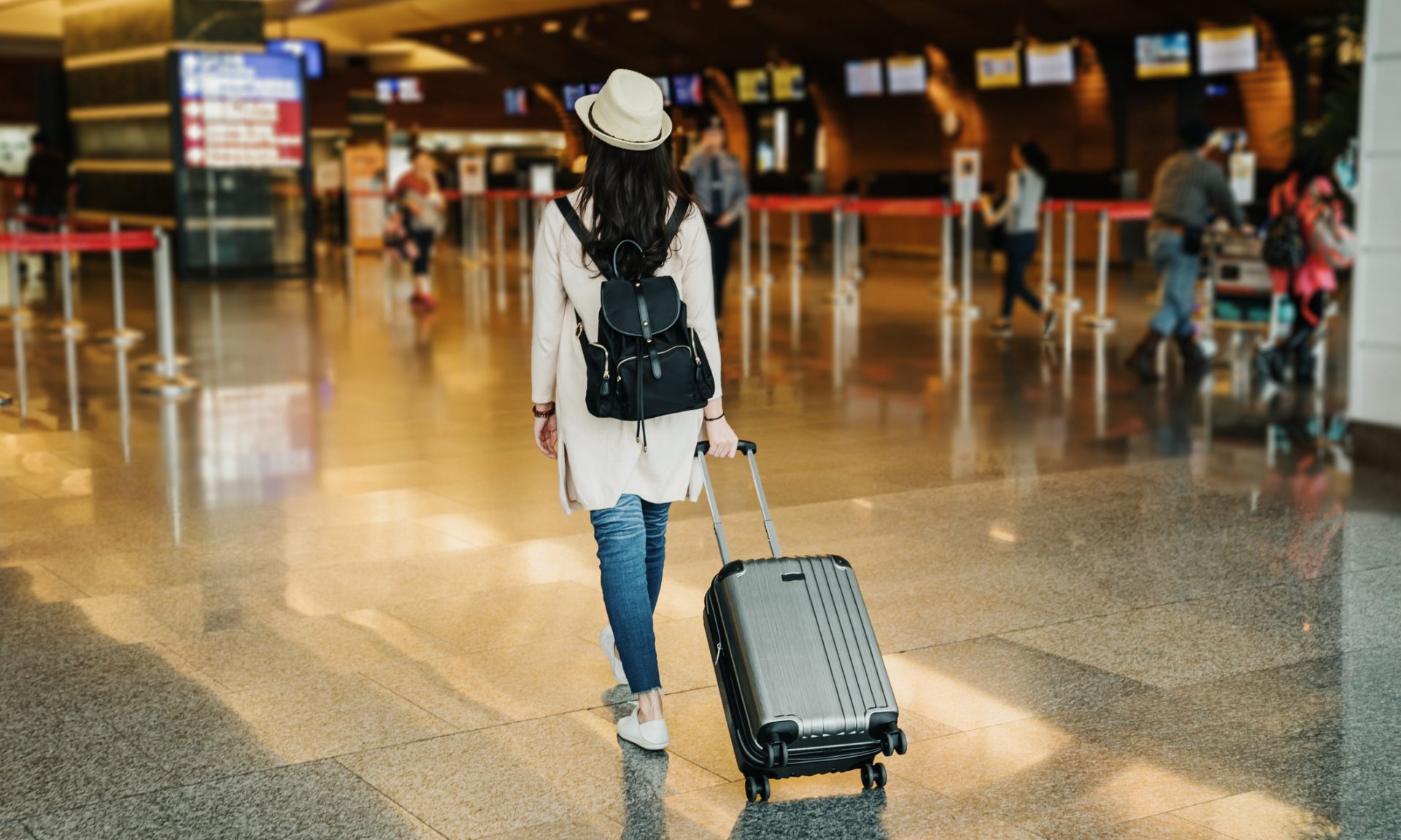 Carry-On vs. Checked Bag: What to Know - NerdWallet