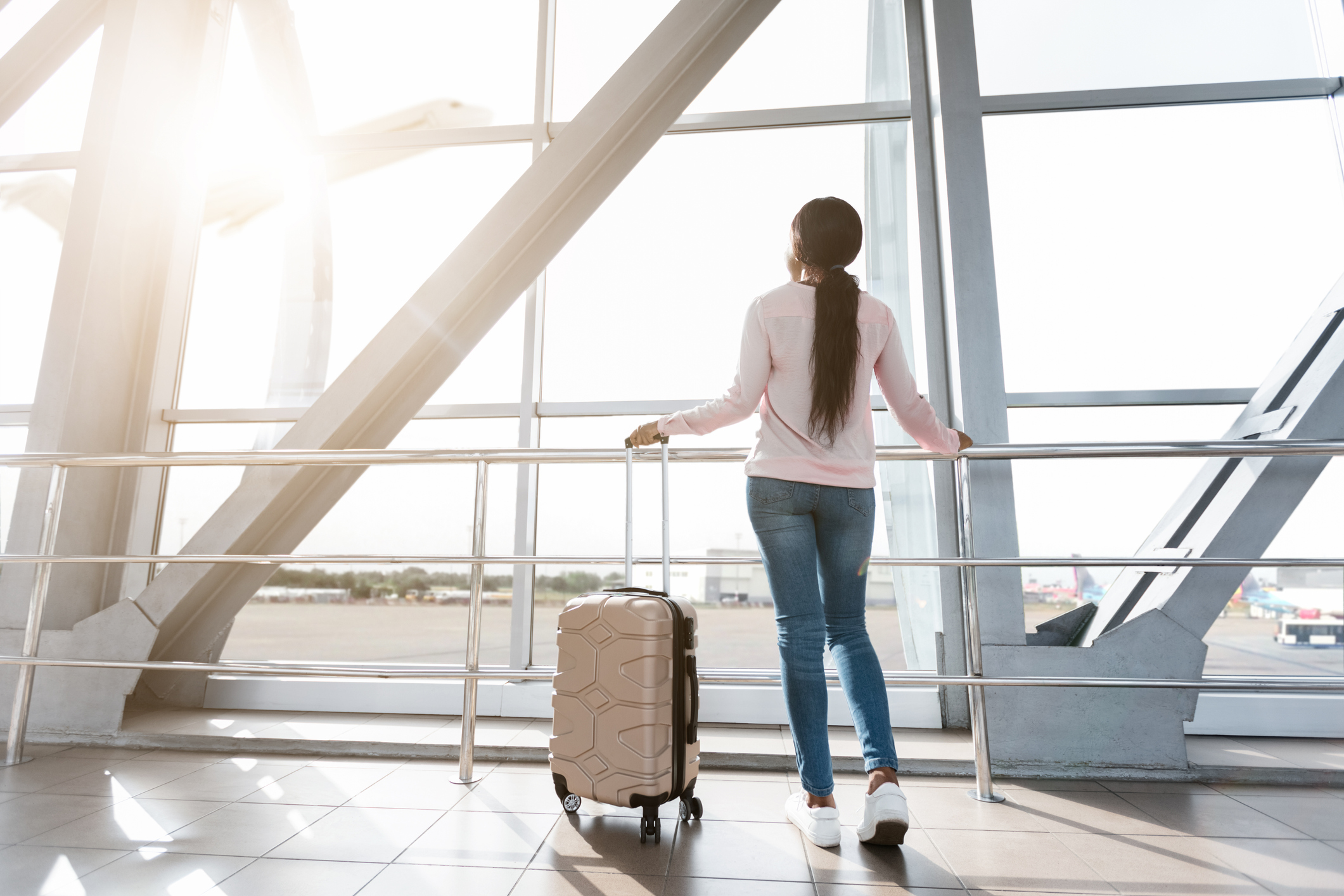 Carry-On vs. Checked Bag: What to Know - NerdWallet