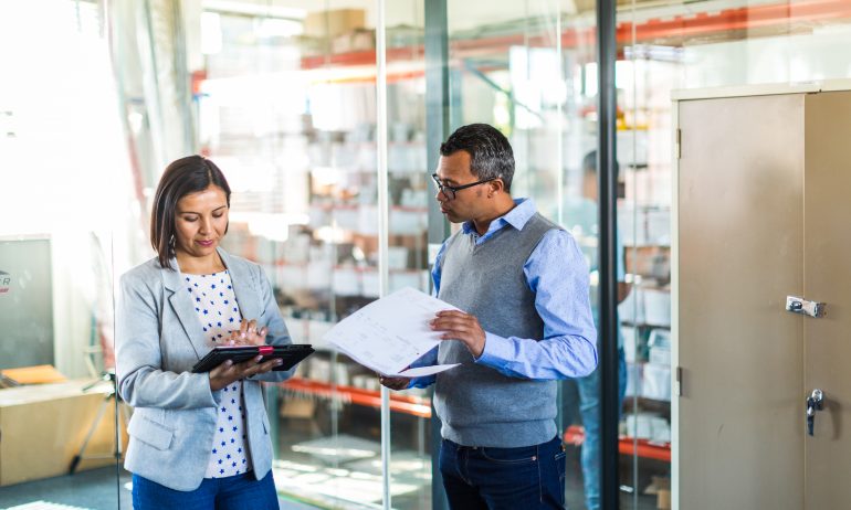 Two managers talking in a small business