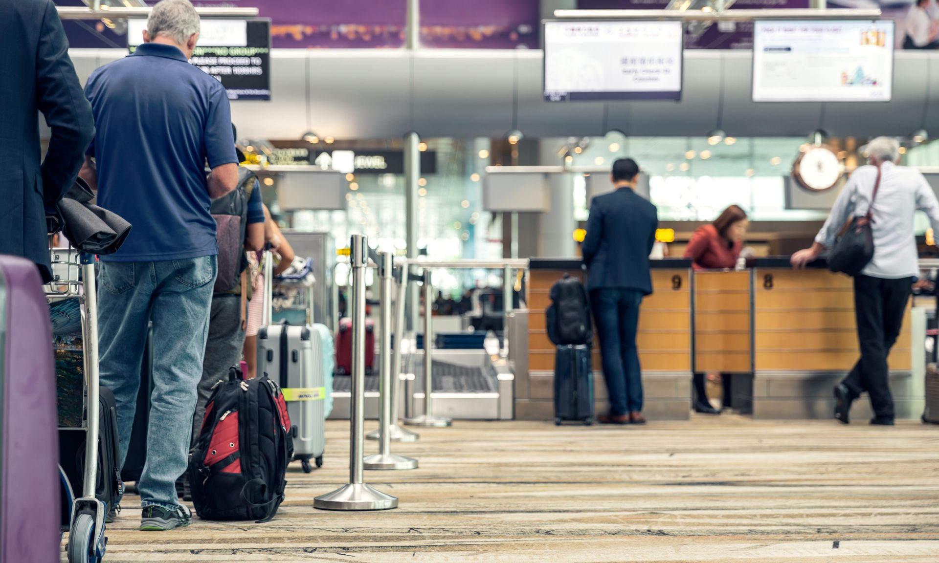 Carry-On vs. Checked Bag: What to Know - NerdWallet