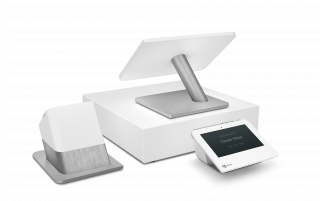 The Clover Station Duo sits against a white background with a screen on top of a cash box, a customer screen facing the camera, and a receipt printer.