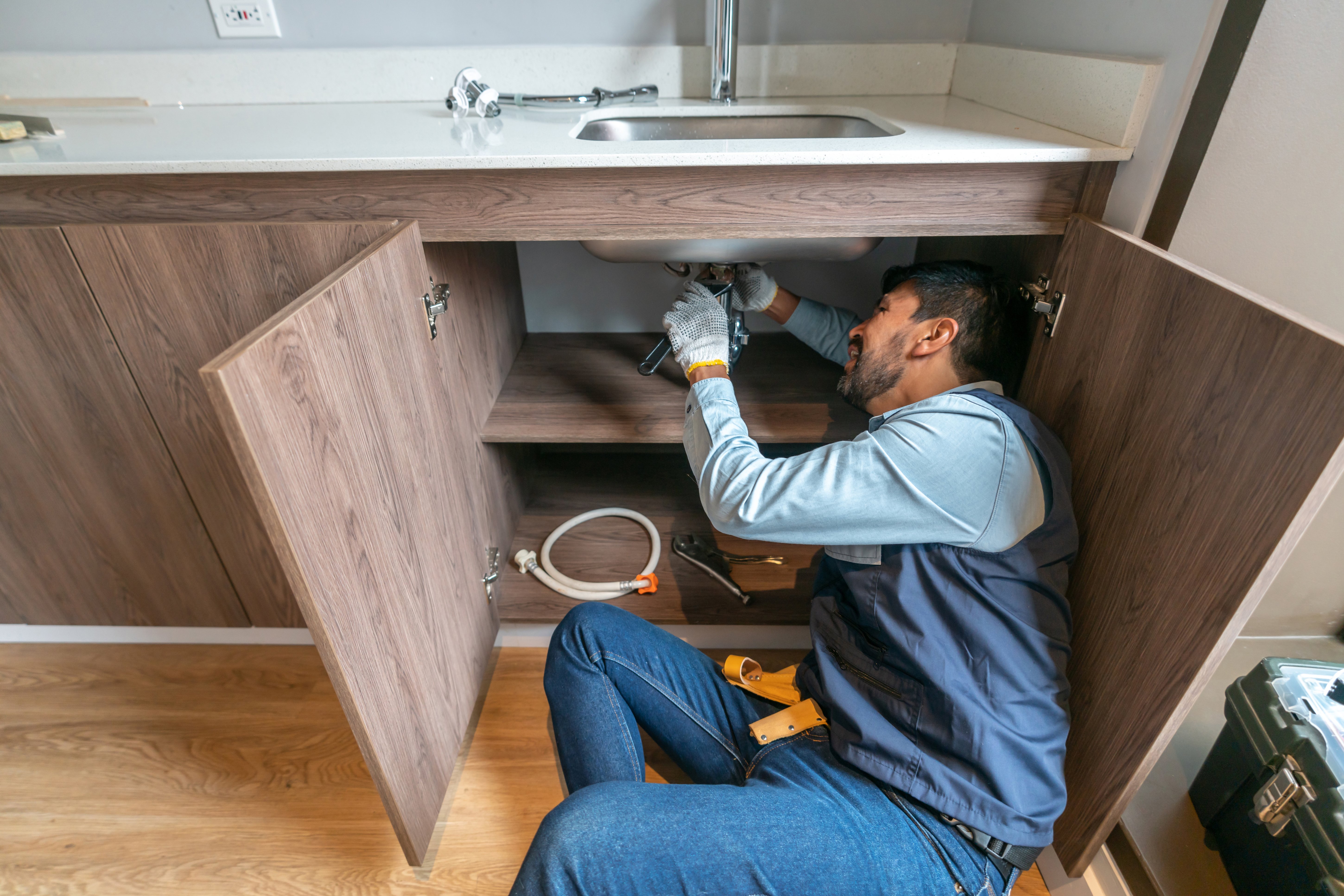 How to Unclog a Kitchen Sink - Home Repair Tutor