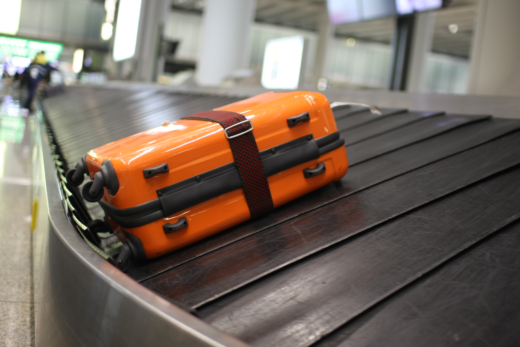 Carry-On vs. Checked Bag: What to Know - NerdWallet