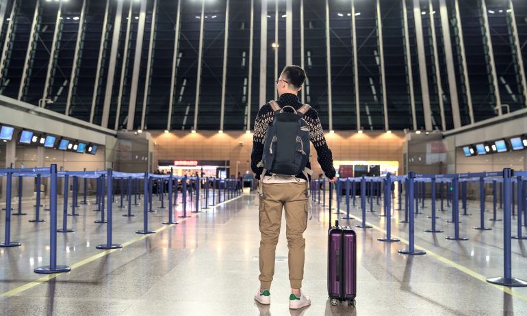 Passengers are waiting at the airport terminal.