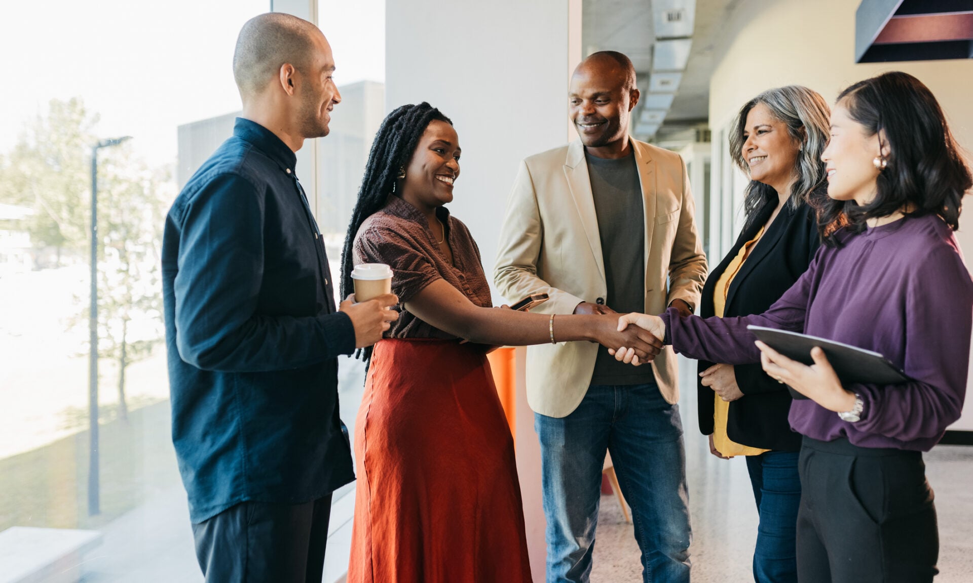 People shaking hands.
