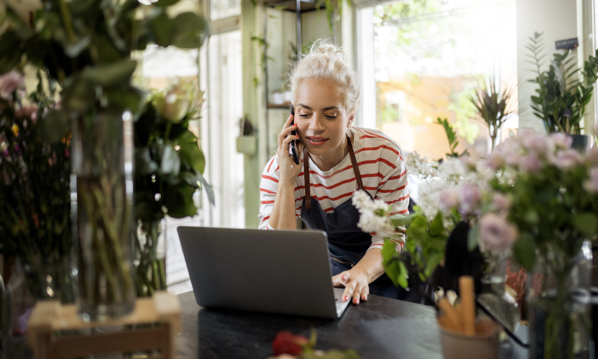 Woman working in flower shop