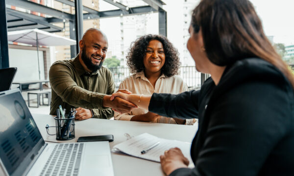 People shaking hands.