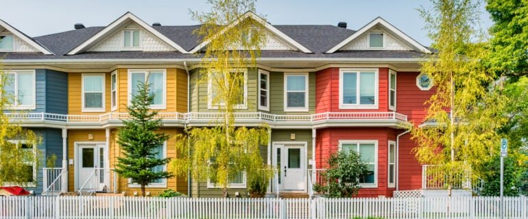 Colorful townhouses in Canada. Other common types of houses in Canada for buyers include detached, semi-detached, townhouses, condominiums and more options.