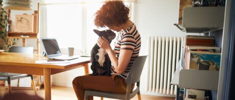 Woman working at home doing home finances.