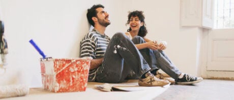 A couple takes a rest from home renovations they financed with a home equity loan.