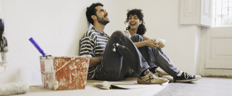 A couple takes a rest from home renovations they financed with a home equity loan.