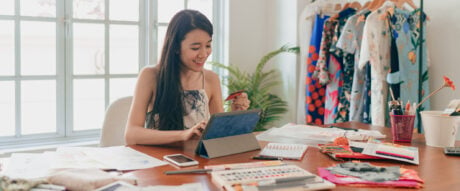 Small business owner using a business credit card to pay for supplies.