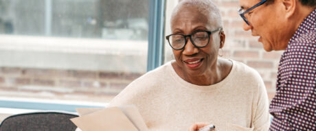 A senior citizen opening a new seniors account at the bank