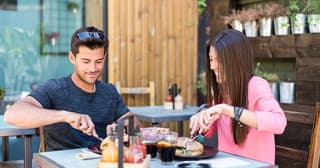 Couple dines at restaurant