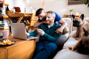 credit card travel insurance being used by men