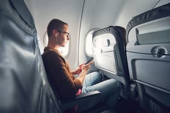 How to Send and Receive Text Messages on a Flight