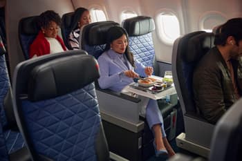 Seated passengers on a Delta aircraft