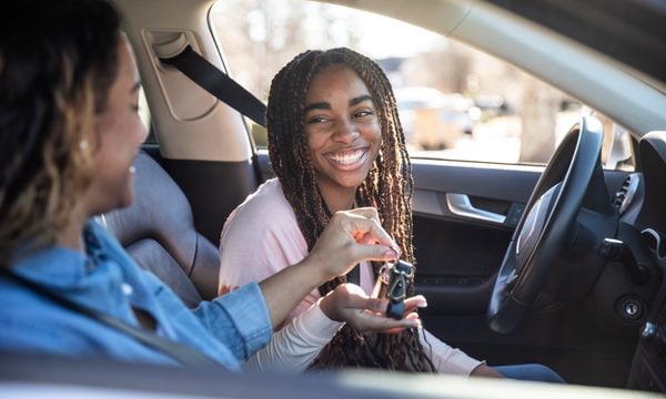 Mom and daughter in their car