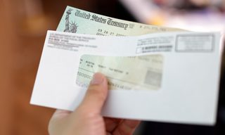 Should you use your tax refund to pay off debt?