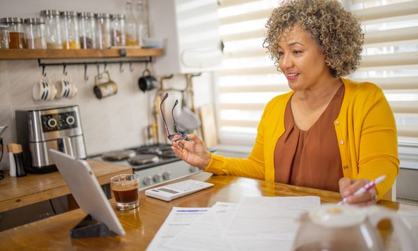 Person doing work at desk.