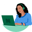 woman on computer with headphones