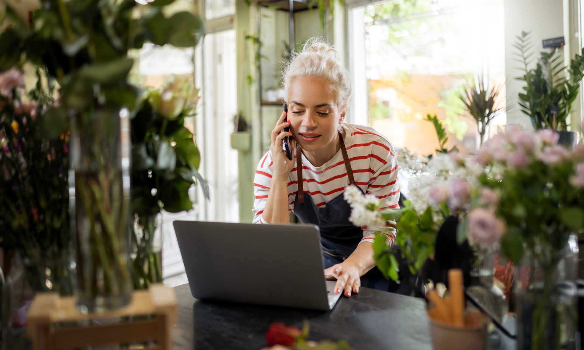 Woman working in flower shop