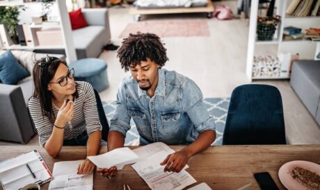 Millennial couple working through debt
